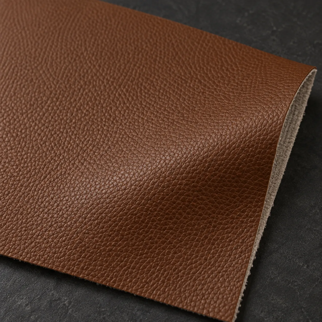 A swatch of brown full-grain leather for an executive chair