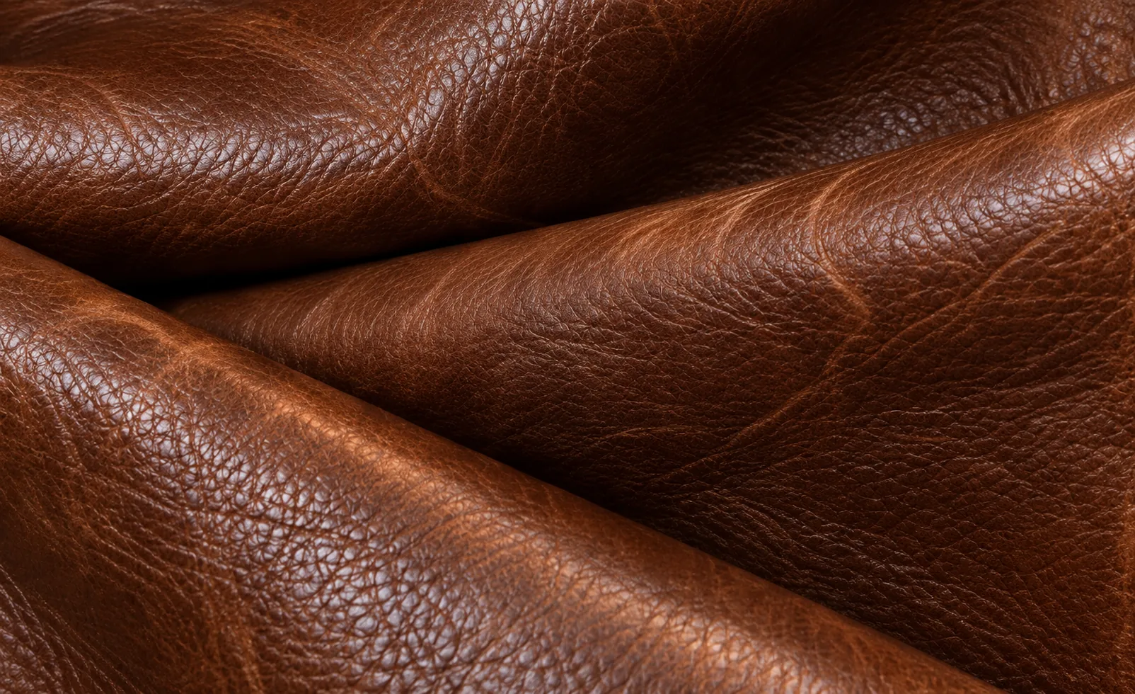 Close detail of full-grain leather showing natural grain and pore texture