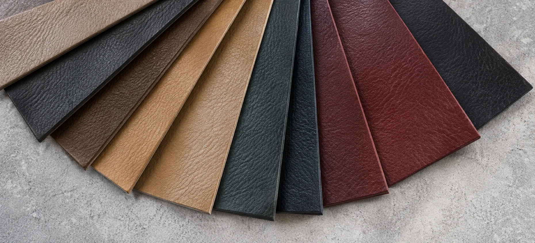 Fanned leather color samples used for Eames leather chair repair color matching
