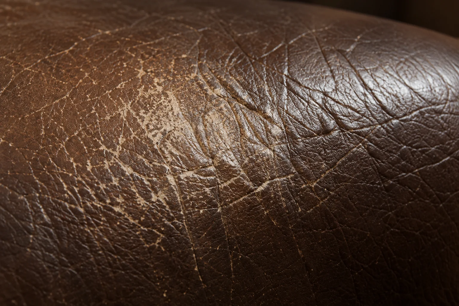 Color loss on a brown leather Herman Miller cushion