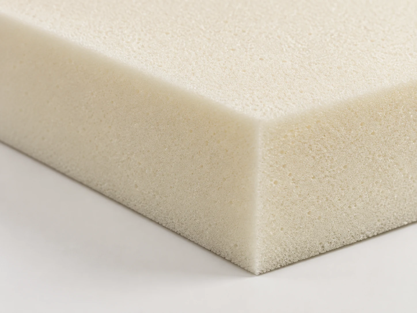 High density foam block cut for a seat cushion core