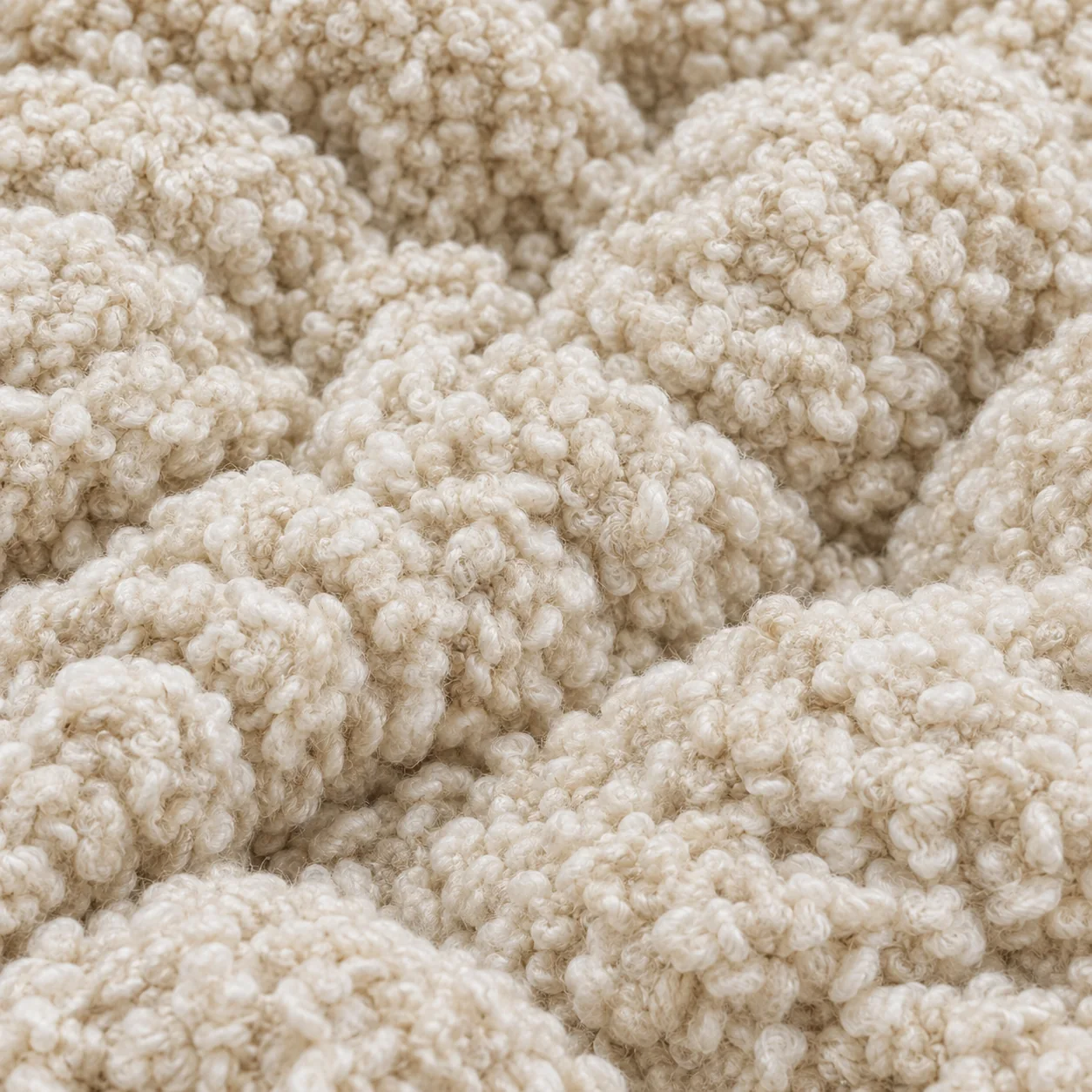 Ivory boucle upholstery texture