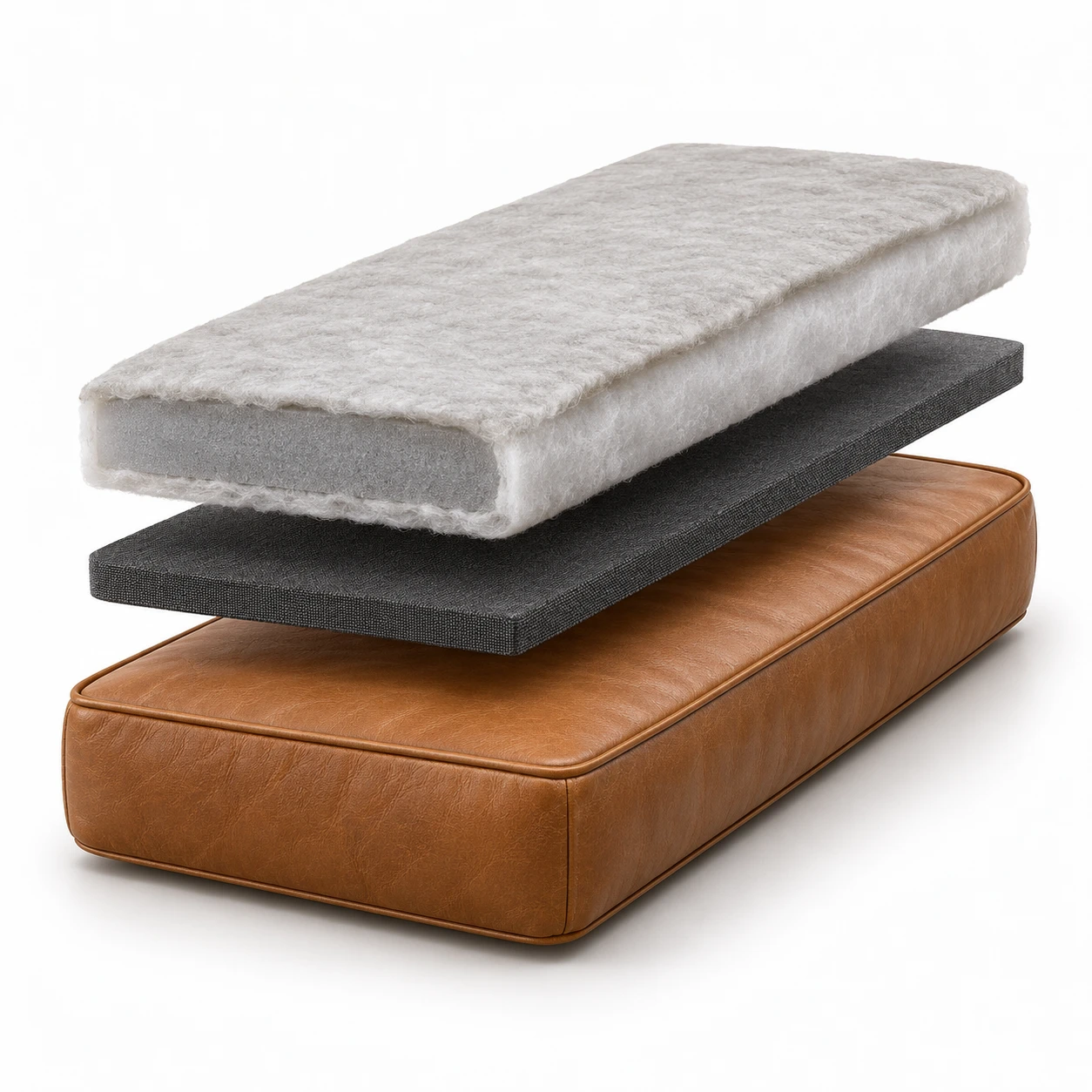 Chaise cushion shown in layers: fibre wrap, foam core and tan leather cover