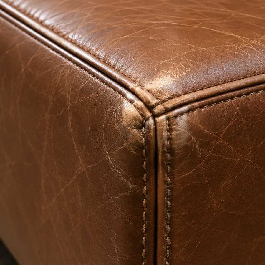 Front nosing edge of a leather sofa seat