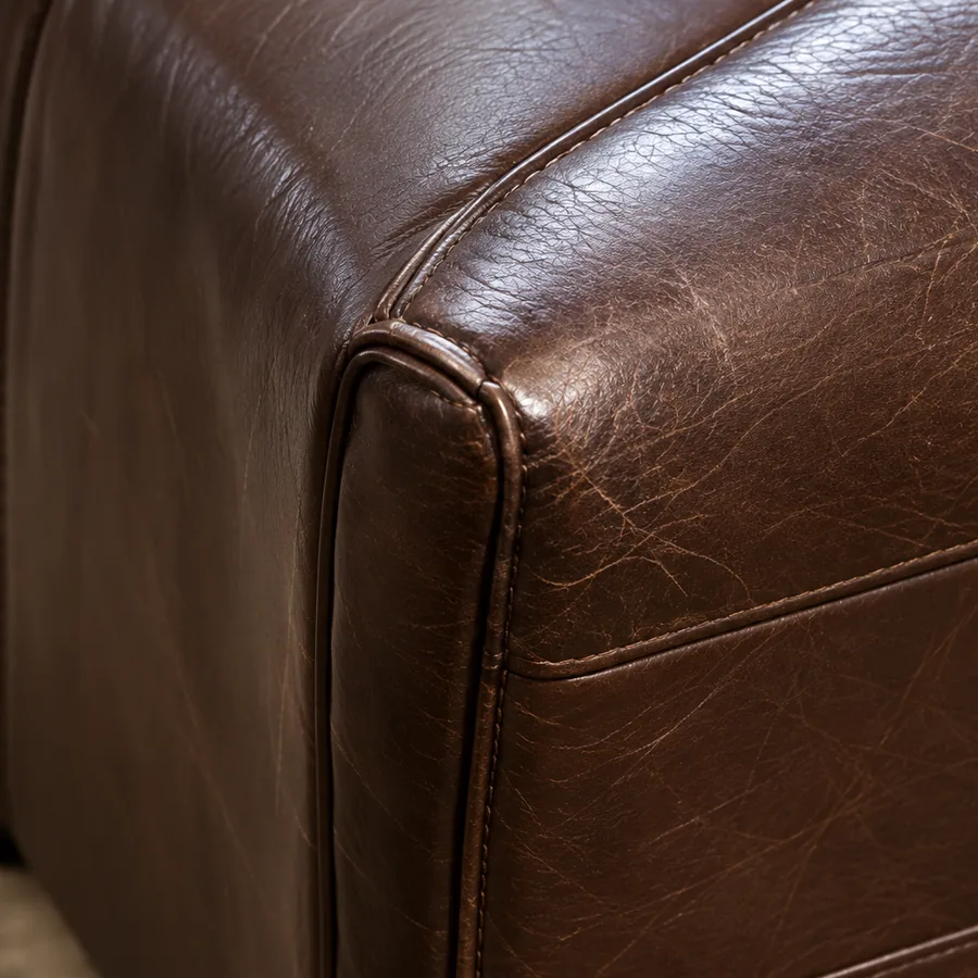 Outside side panel of a leather sofa