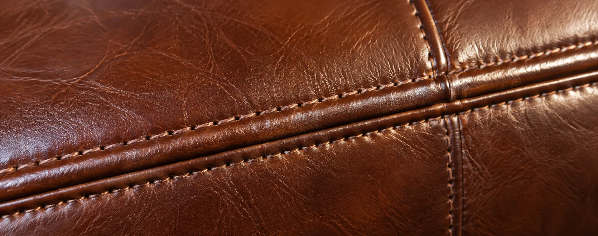 Close-up of a stitched leather seam