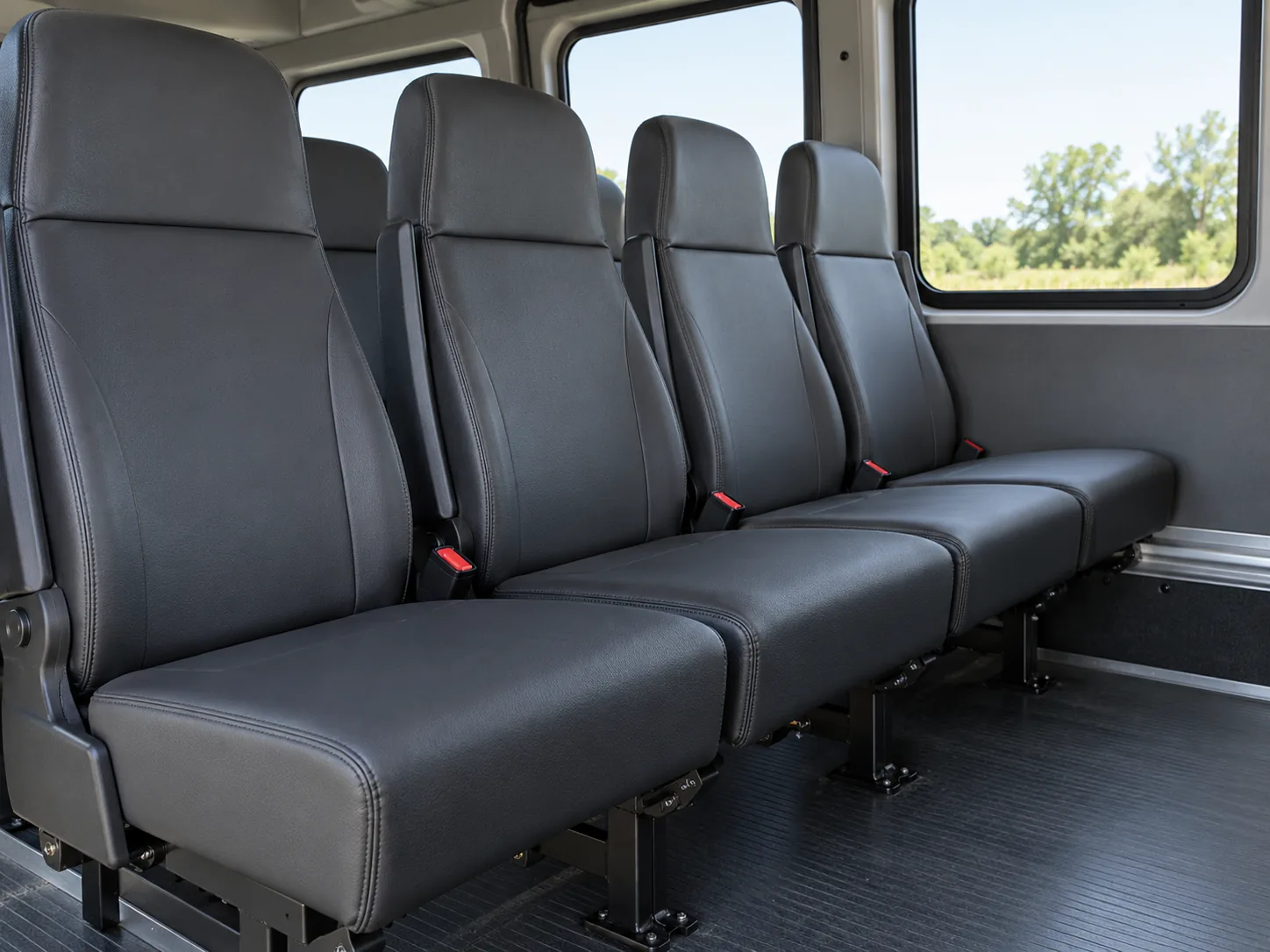 A row of vehicle seats after foam work, all sitting at the same height