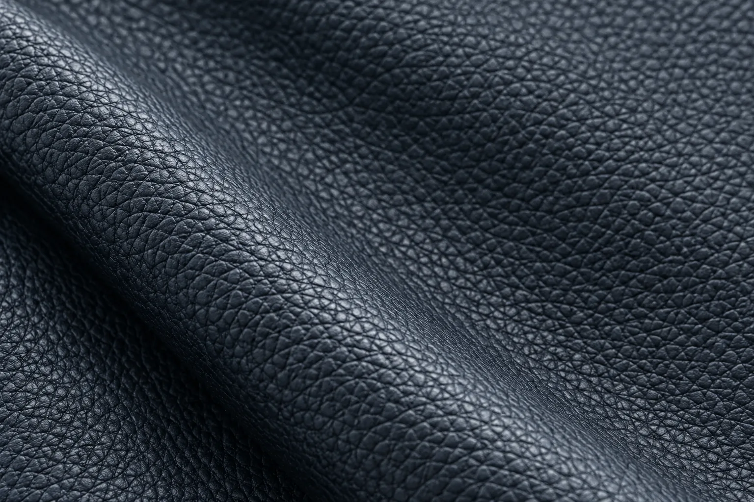 Navy pebble-grain leather swatch for a headboard