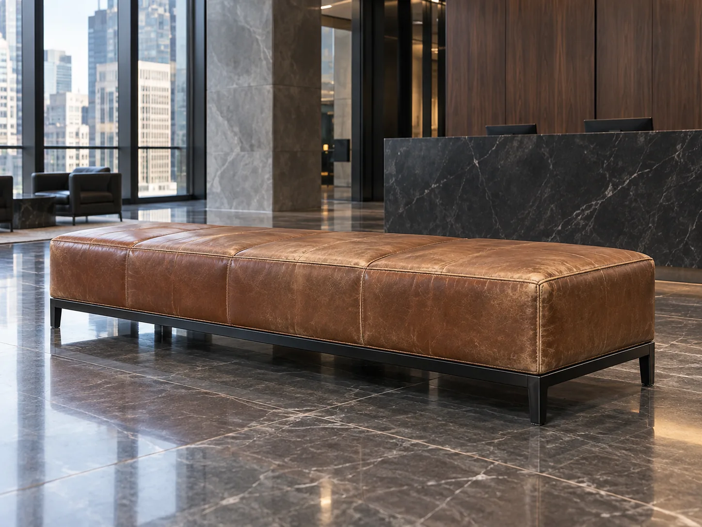 A faded leather reception bench before restoration