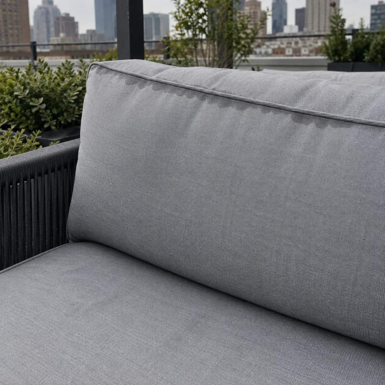 Faint water staining along the welt of an outdoor cushion