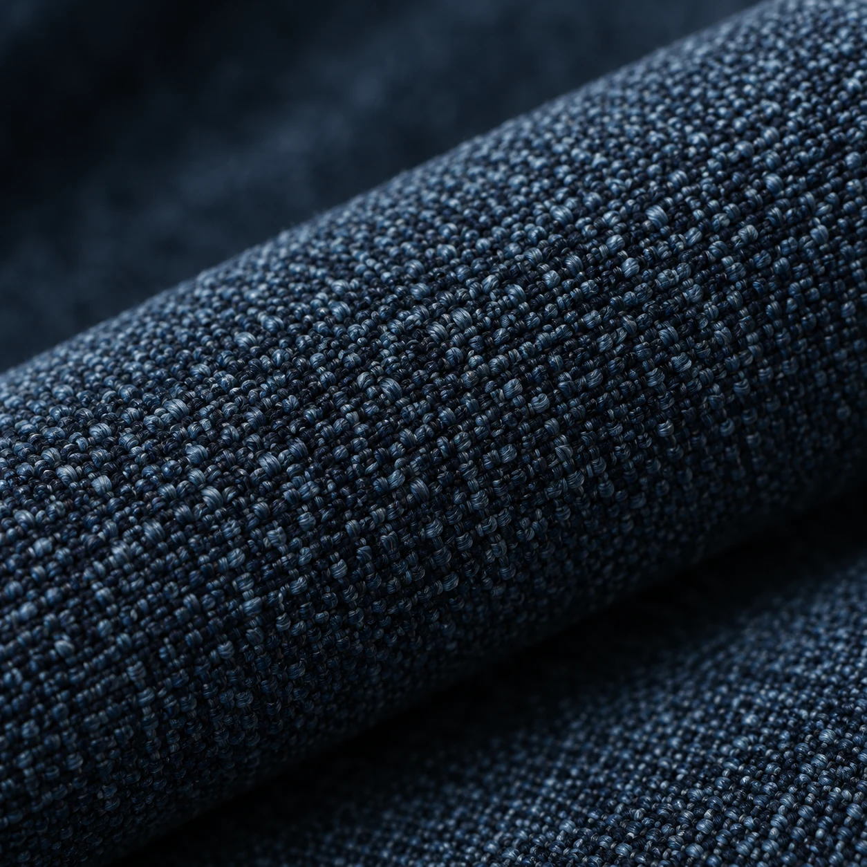 Roll of navy woven performance upholstery textile