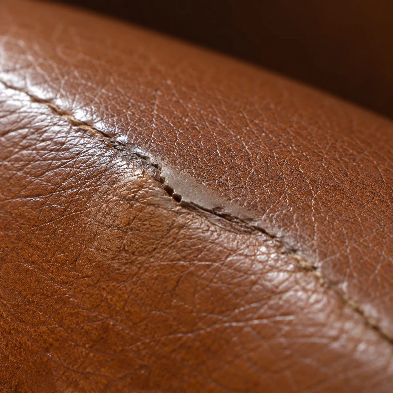 Raised filler ridge along a crack