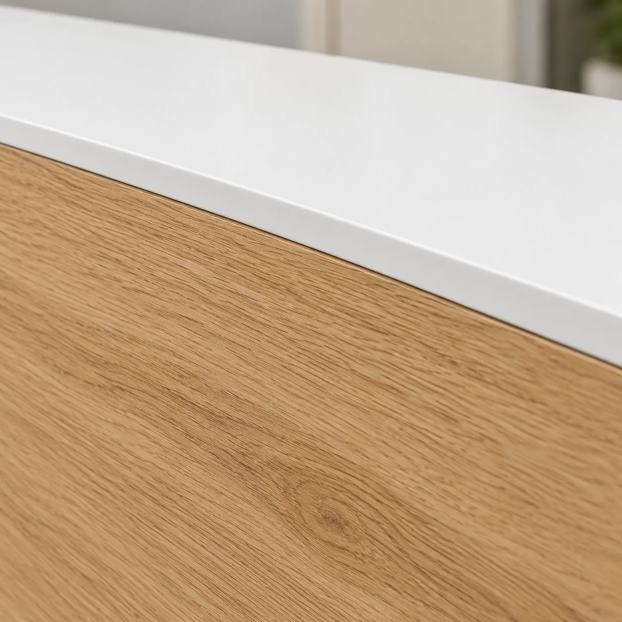 Close view of a wood laminate desk edge