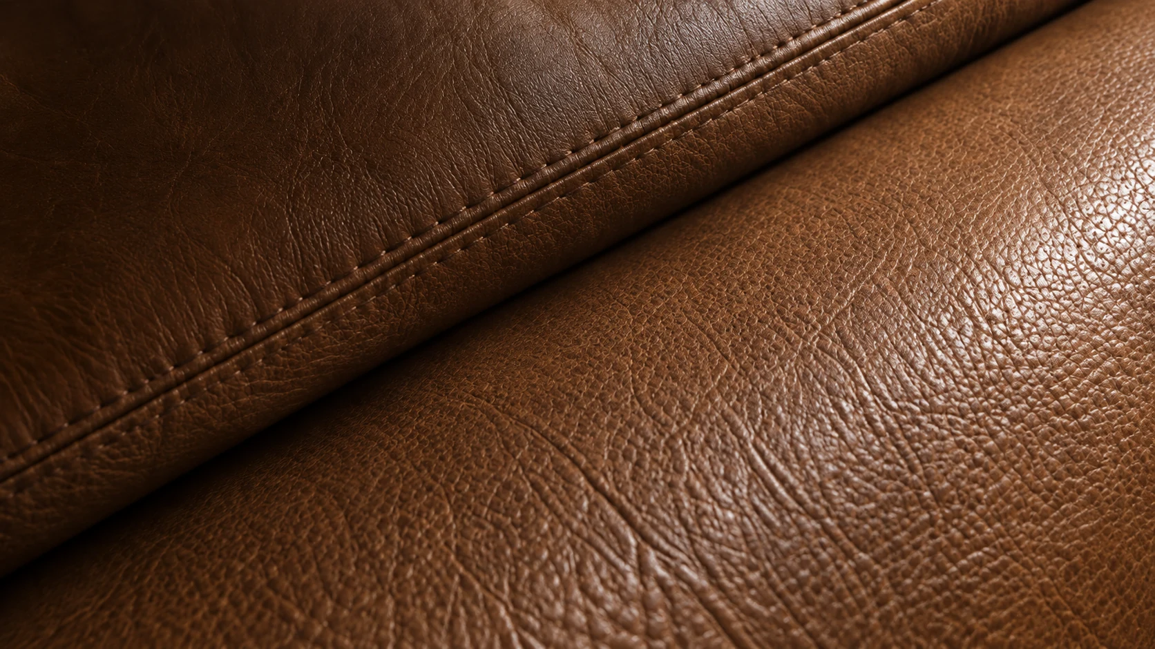 A restored leather sectional with even colour and finish