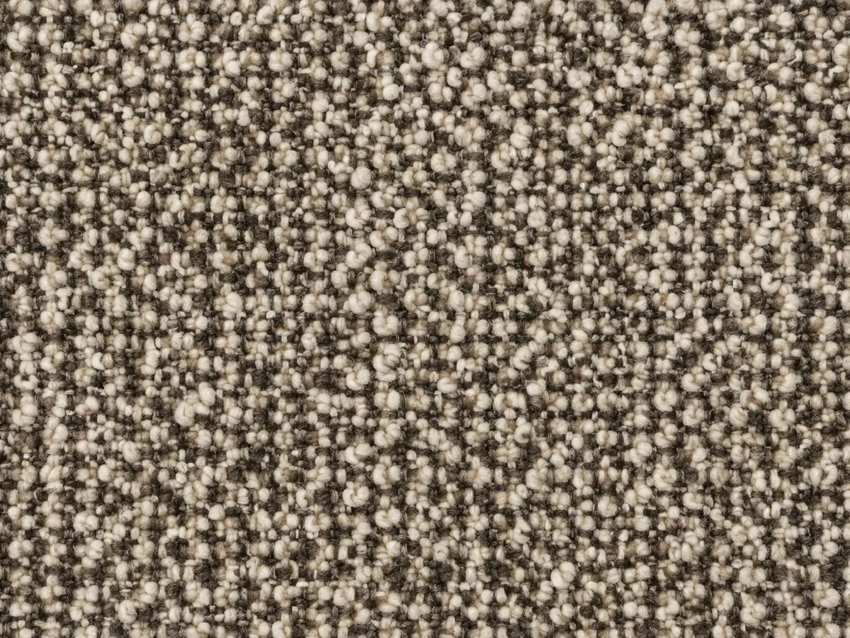 Cream and brown bouclé with a looped, nubbly yarn and a heavy texture