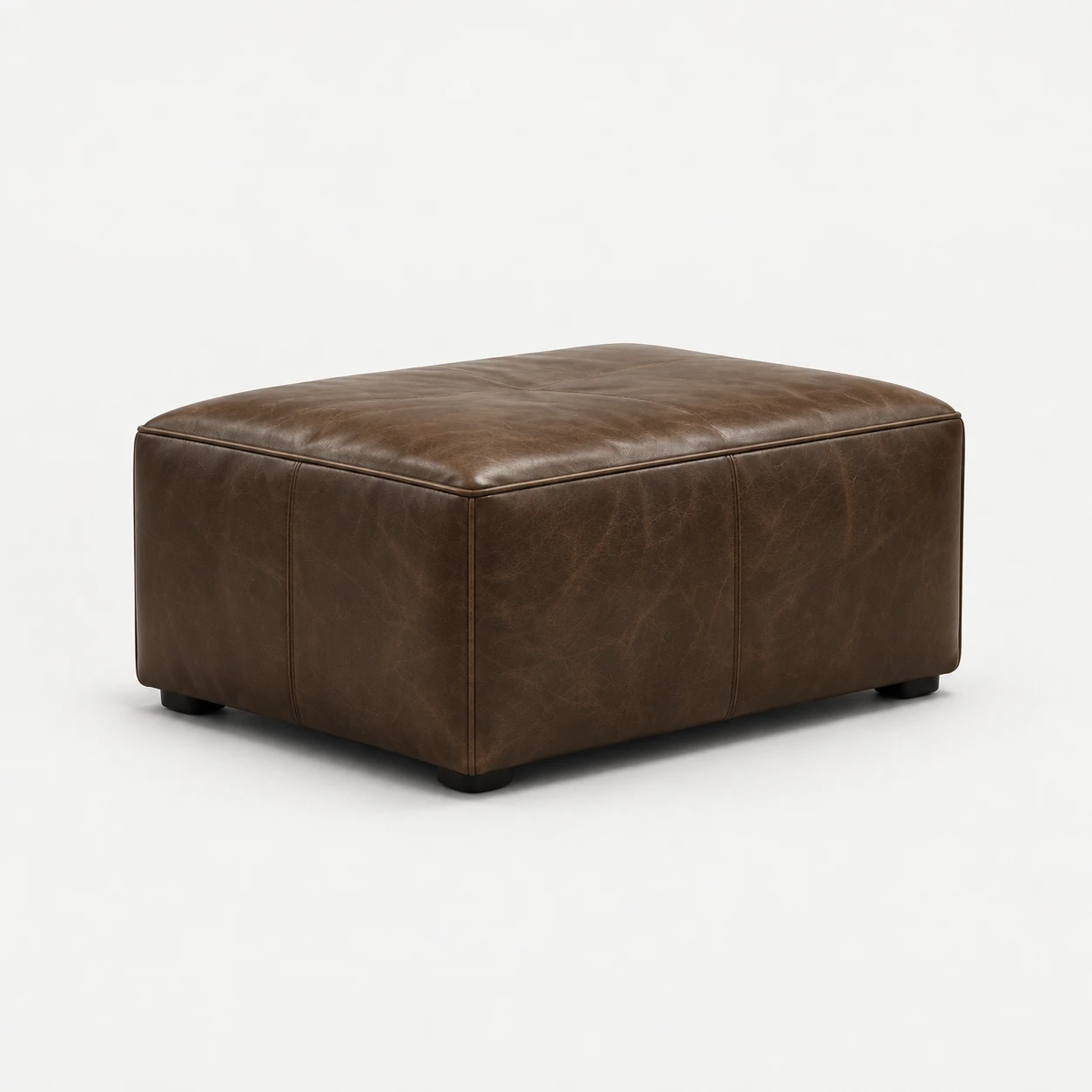 Large rectangular brown leather ottoman with a single-panel top