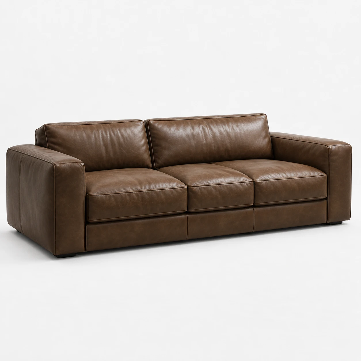 Three-seat brown leather RH sofa with track arms, shown against a plain background