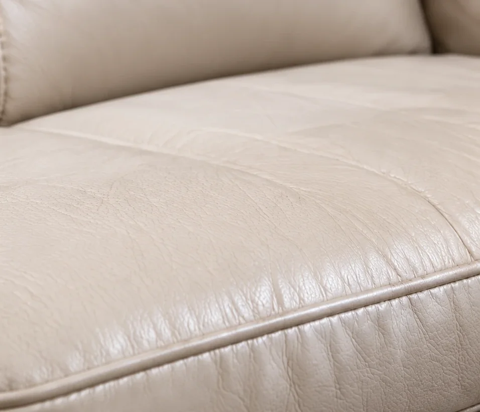The same cream cushion cleaned and treated, back to an even colour