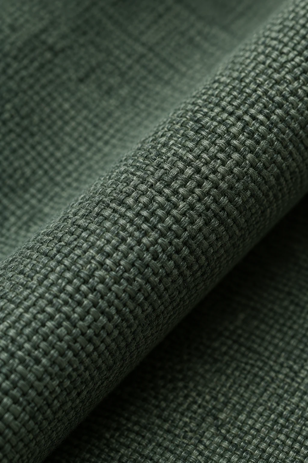 Roll of dark green solution-dyed acrylic outdoor fabric