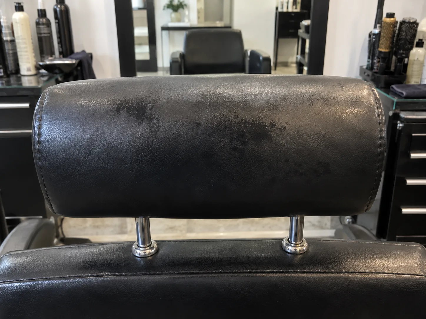 A stained styling chair headrest