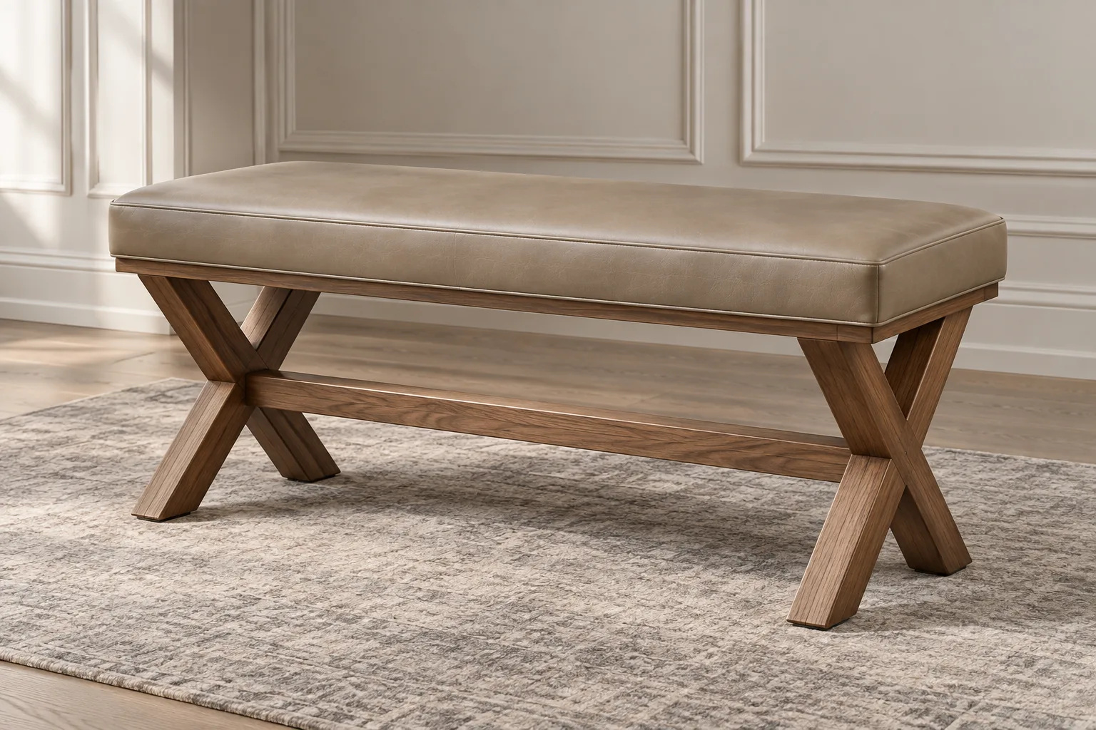 Taupe leather bench on a crossed wooden X-frame base