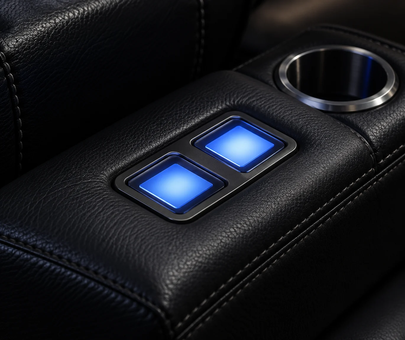 Home theater console with a cupholder and an illuminated blue control panel