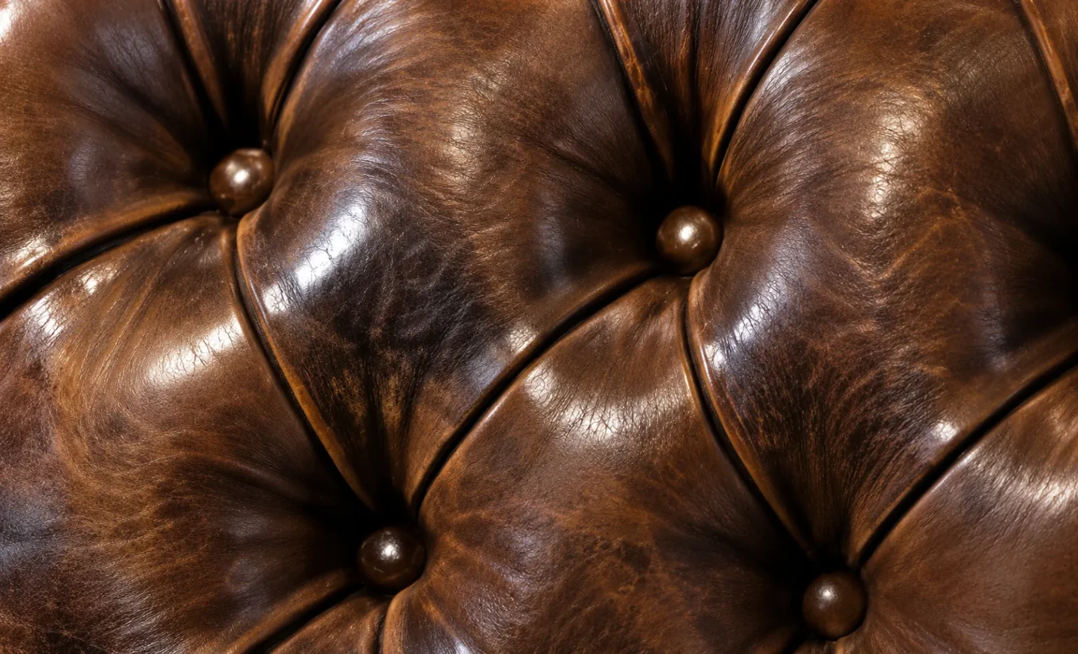 Deep-buttoned tufted leather